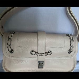 Authentic Chanel flap bag is very unique. This beautiful bag is blush colored.